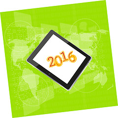 Image showing tablet pc or smart phone on business digital touch screen, world map, happy new year 2016 concept