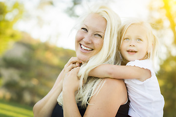 Image showing Mother and Little Girl Having Fun Together in Grass