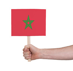 Image showing Hand holding small card - Flag of Morocco