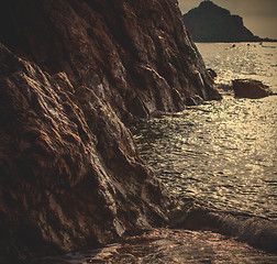 Image showing sunset near ancient cliff, marine landscape