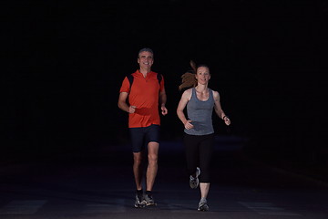 Image showing couple jogging at early morning