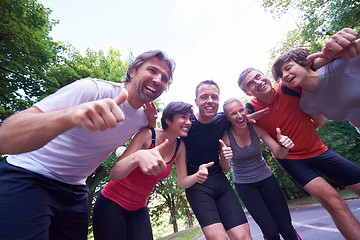 Image showing jogging people group have fun