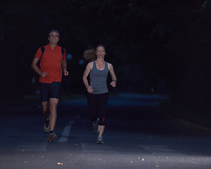 Image showing couple jogging at early morning