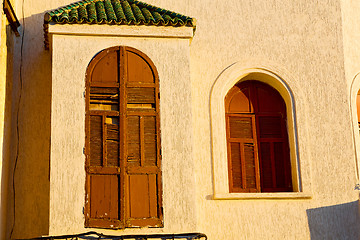 Image showing   yellow window in  wall  