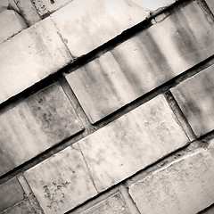 Image showing in london abstract texture of a ancien wall and ruined brick