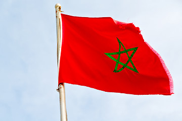 Image showing tunisia  waving flag in the blue sky  