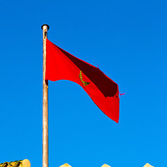 Image showing tunisia  waving flag in the blue sky  colour and battlements  wa