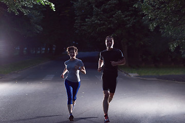 Image showing couple jogging at early morning