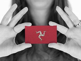 Image showing Woman showing a blank business card