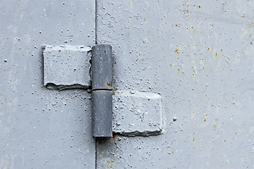 Image showing Metal hinge welded to steel plates and painted