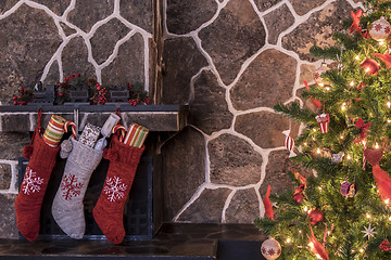 Image showing Christmas stockings and tree