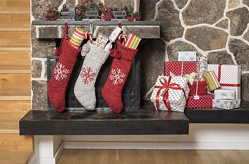 Image showing Christmas stockings and presents