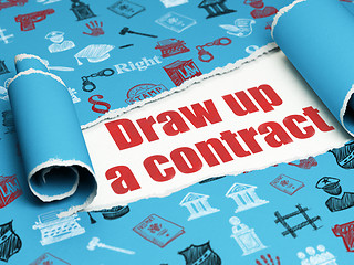 Image showing Law concept: red text Draw up A contract under the piece of  torn paper