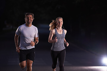 Image showing couple jogging at early morning