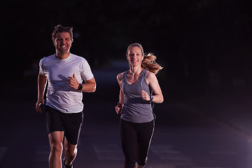 Image showing couple jogging at early morning