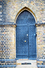 Image showing wooden parliament in london old   door and  