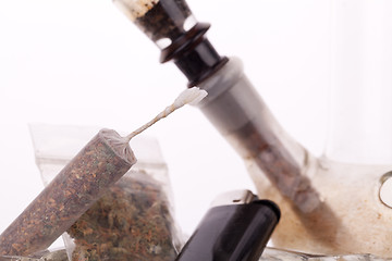 Image showing Close up of marijuana and smoking paraphernalia