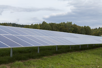 Image showing Field with blue siliciom solar cells alternative energy