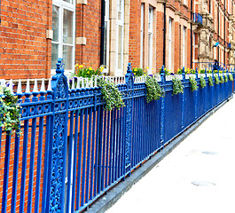 Image showing old window in europe london  red brick wall     and      histori