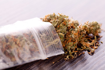 Image showing Close up Dried Marijuana Leaves on the Table