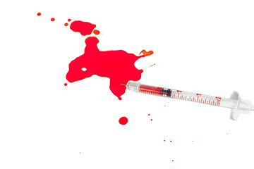 Image showing Syringe Squirting Red Blood onto White Background