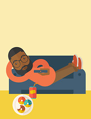 Image showing Man lying on sofa.