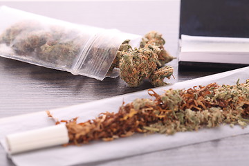 Image showing Dried Cannabis on Rolling Paper with Filter