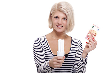 Image showing Woman holding an eco-friendly light bulb