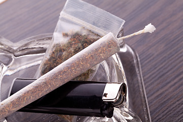 Image showing Close up of marijuana and smoking paraphernalia