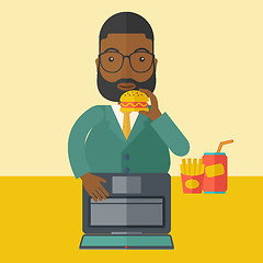 Image showing Man eating hamburger. 