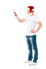 Image showing Young man in Santa hat