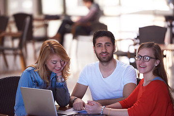 Image showing students group working on school  project  together