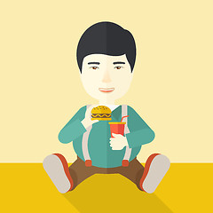 Image showing Man eating hamburger. 