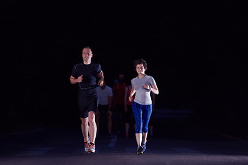 Image showing couple jogging at early morning