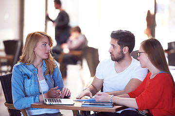 Image showing students group working on school  project  together