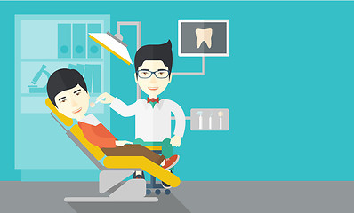 Image showing Patient and dentist.