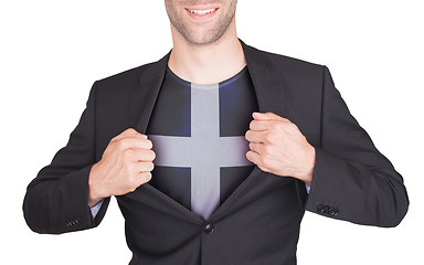 Image showing Businessman opening suit to reveal shirt with flag