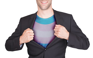 Image showing Businessman opening suit to reveal shirt with flag