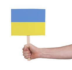 Image showing Hand holding small card - Flag of Ukraine