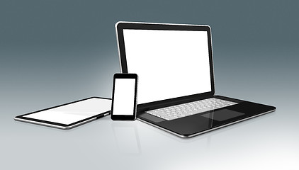 Image showing High Tech computer set. Laptop, mobile phone and digital tablet 