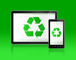 Image showing Digital tablet PC with a recycling symbol on screen. ecological 