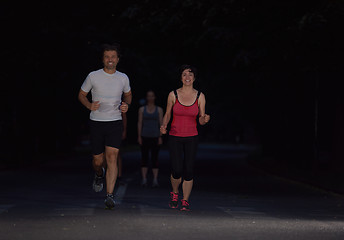 Image showing couple jogging at early morning