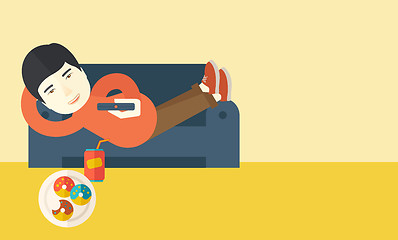 Image showing Man lying on sofa.