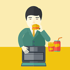 Image showing Man eating hamburger. 