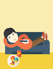 Image showing Man lying on sofa.