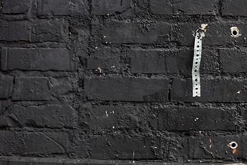 Image showing Black brick wall