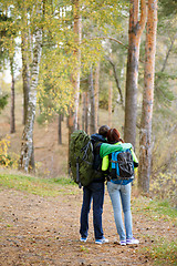 Image showing woman and man hugging from back