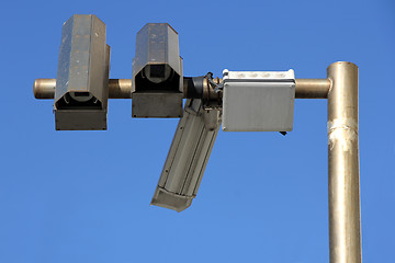 Image showing Three outside security cameras