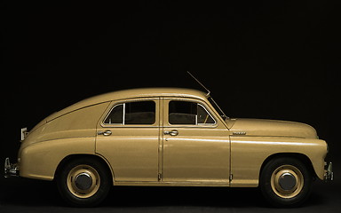 Image showing  retro car side view on a black background