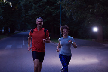 Image showing couple jogging at early morning